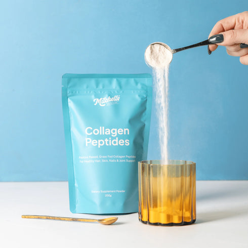 Image of Bovine Collagen Peptides Powder 200g poured into glass