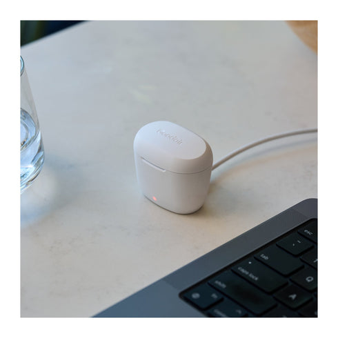 Goodair Nosebuds charging case on a desk beside a keyboard