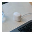 Goodair Nosebuds charging case on a desk beside a keyboard