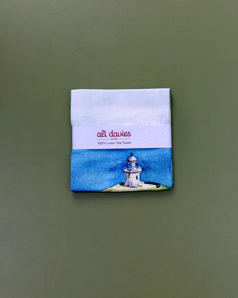 Tea Towel - Cape Reinga/Te Rerenga Wairua-By Ali Davies-Matakana Pharmacy