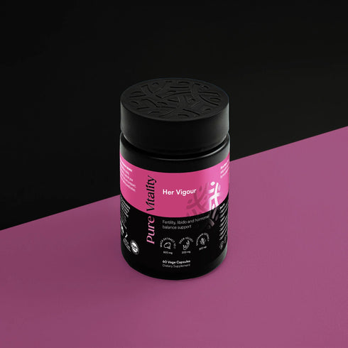 Image of Her Vigour 60caps bottle with a black and pink background