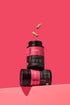 Image of Her Vigour 60caps bottle open with yellow capsules showing