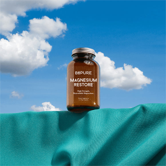 Image of Magnesium Restore 120caps on a table with blue sky above