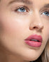 Image of a young girl's face with the Natio Light tinted moistuiser SPF50+ applied