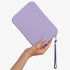 The Strapsicle Clutch in Lilac, Large size, held in one hand