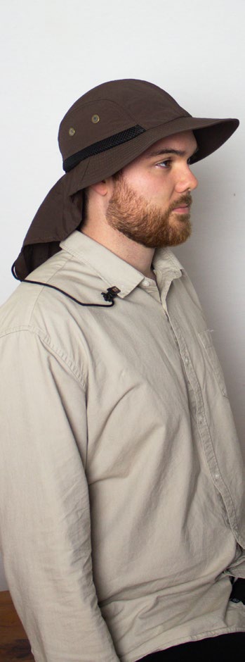 Male model wearing Unisex Hat Highlander Steel in brown