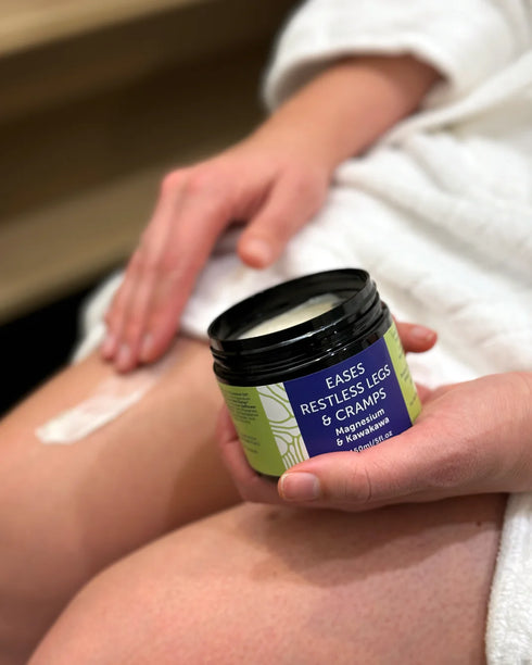 Image of WILD KIWIHEARTS Magnesium & Kawakawa Cream being rubbed into leg