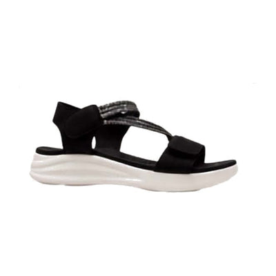 Walkable Beach Benni women's sandal in black and white with adjustable straps, side view