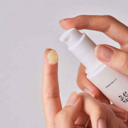 Image of Ginseng Moisturiser Sun Serum SPF50+ 50ml on finger