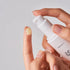 Image of Ginseng Moisturiser Sun Serum SPF50+ 50ml on finger