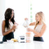 Image of Raw Protein Paleo Fermented Vanilla Lucuma being made into smoothies by two woman