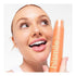 Image of woman holding HISMILE Toothpaste Peach Iced Tea 60g