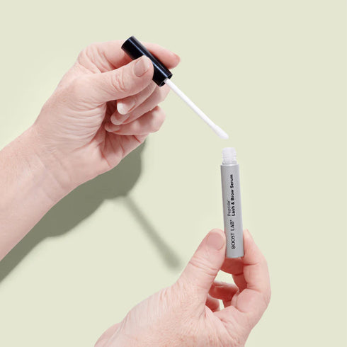 Image of Boost Lab lash and brown serum bottle