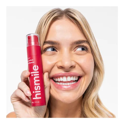 Image of woman holding HISMILE Toothpaste Red Velvet 60g