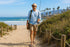 Man walking a beach track in Walkable Beach Venice jandals