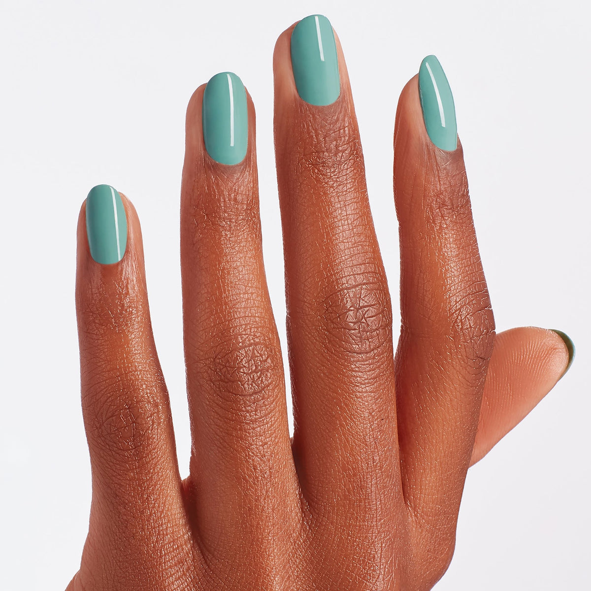 A manicure painted in OPI Verde Nice to Meet You