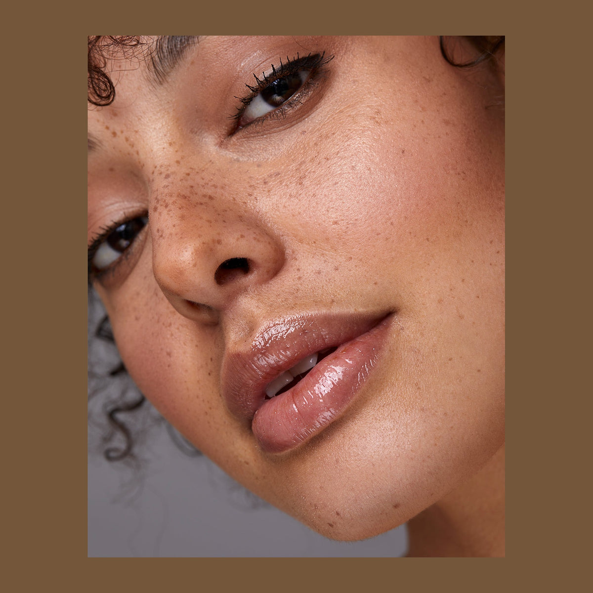 Natio Antioxidant Lip Shine Grace shown in use