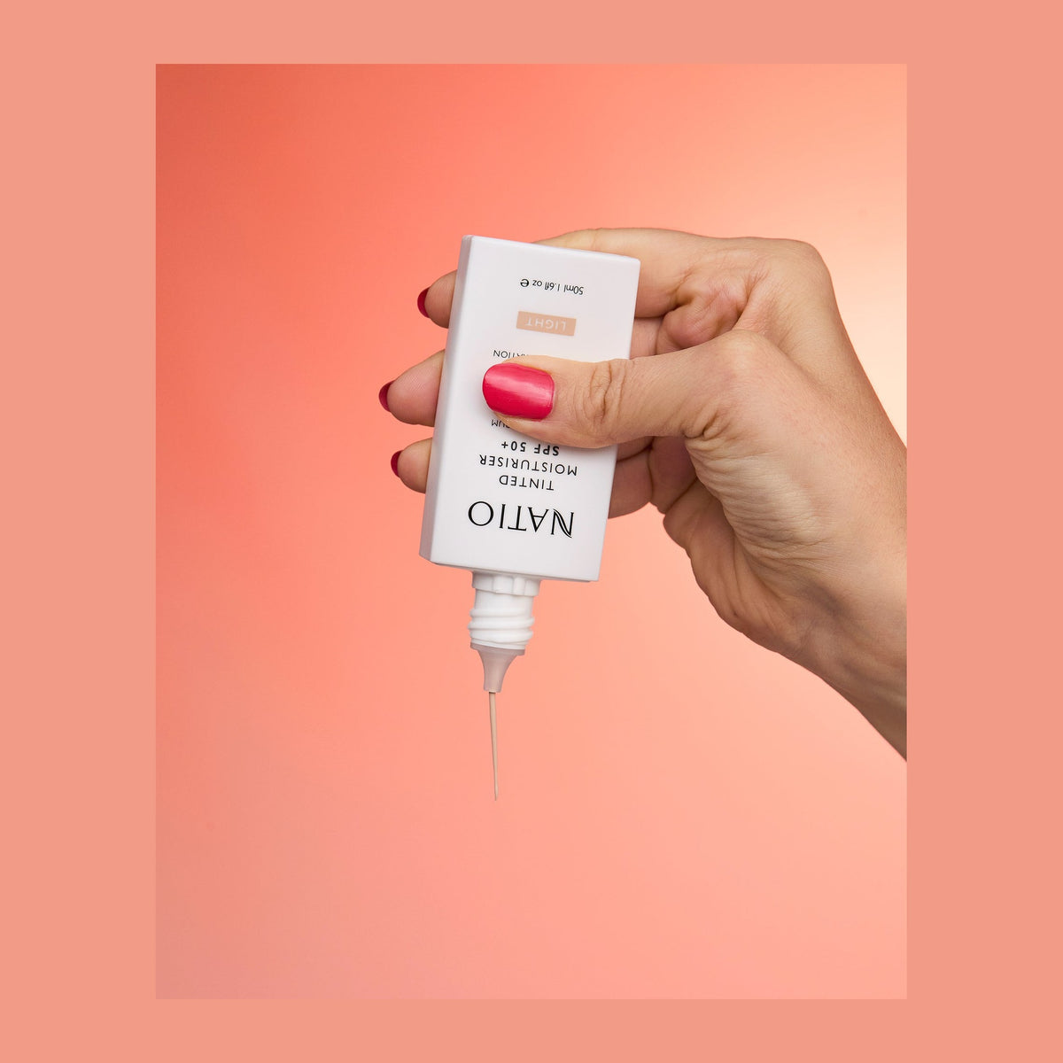 Natio Tinted Moisturiser SPF50 Light shown in use