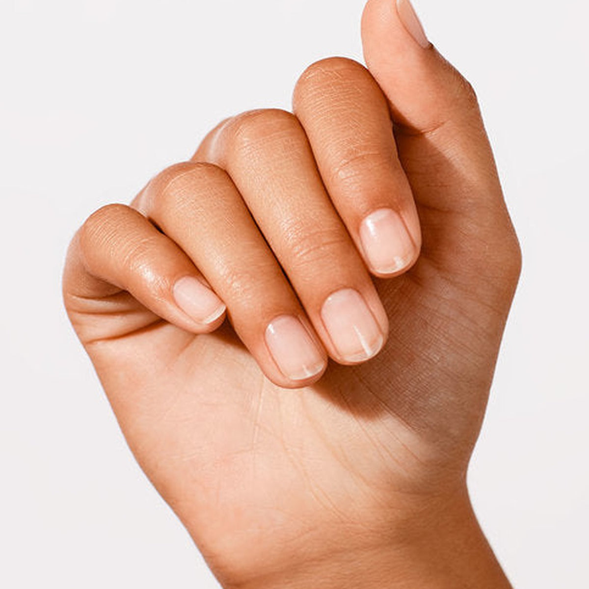 A manicure painted in OPI Nail Envy Sensitive & Peeling