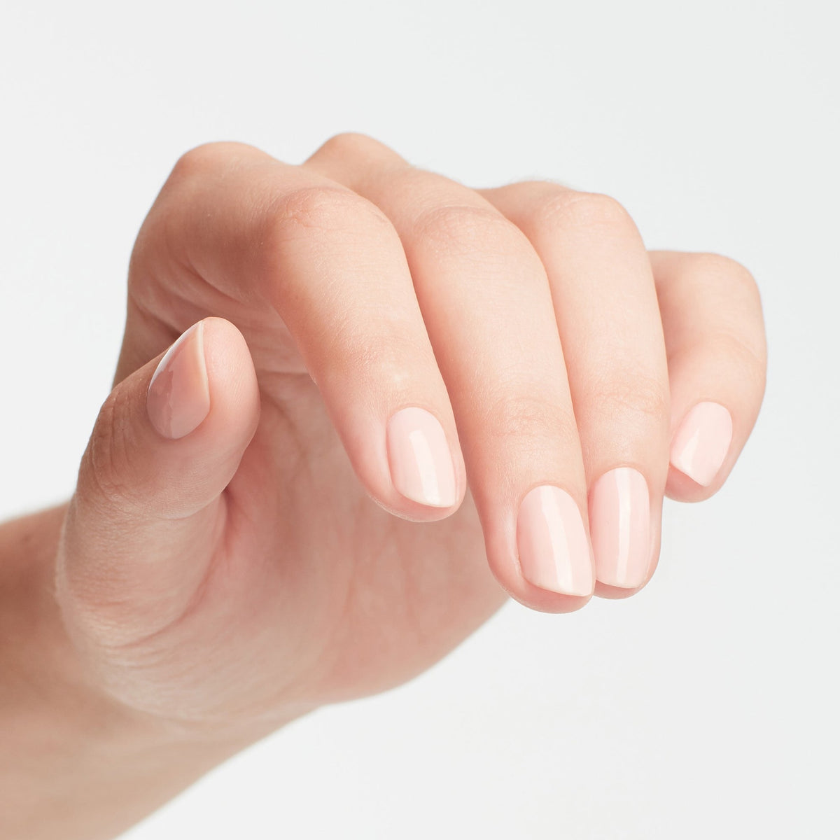 A manicure painted in OPI Bubble Bath