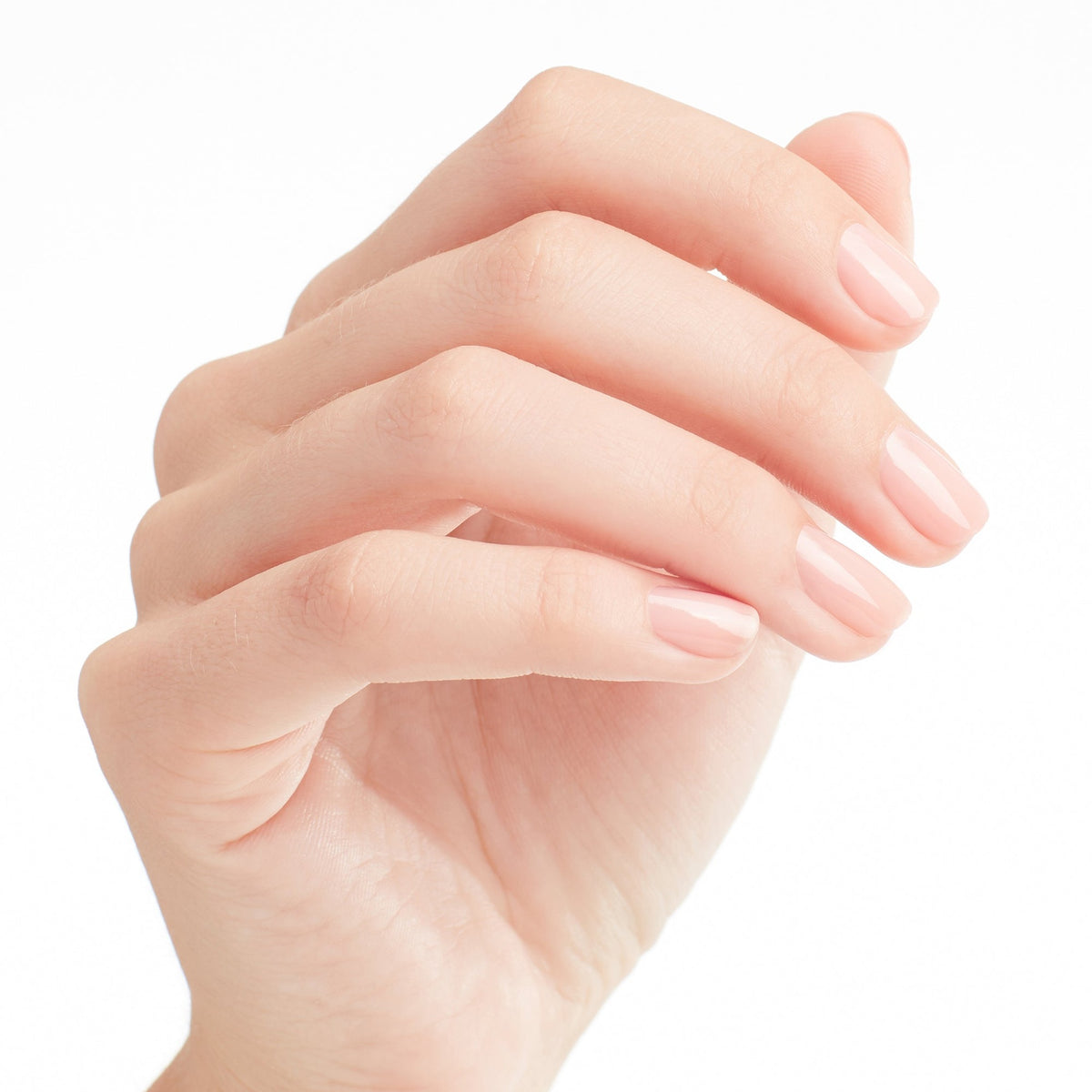 A manicure painted in OPI Passion Pale Pink