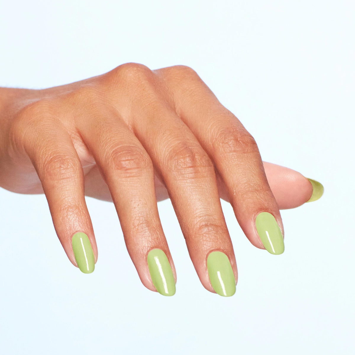 A manicure painted in OPI Clear Your Cash
