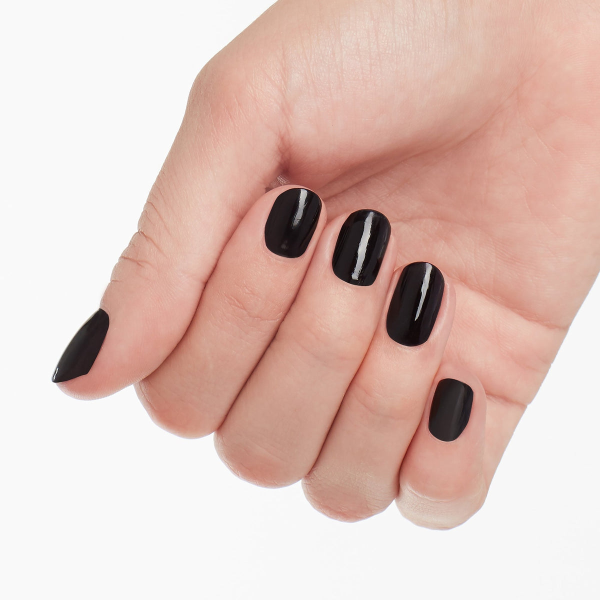 A manicure painted in OPI Lincoln Park After Dark