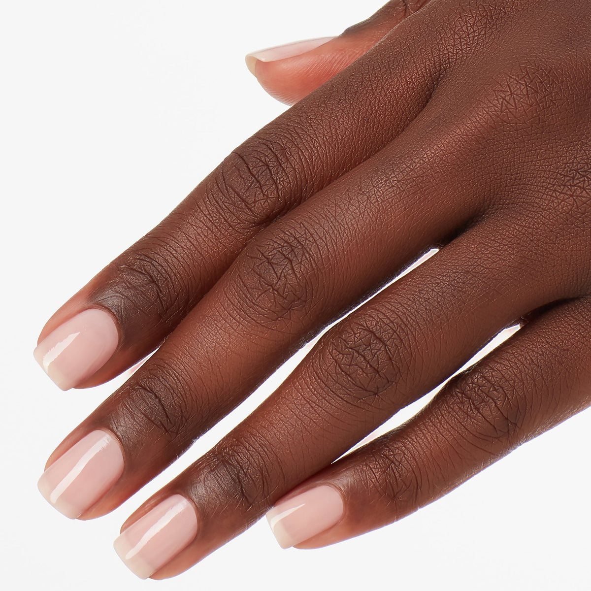 A manicure painted in OPI Put it in Neutral
