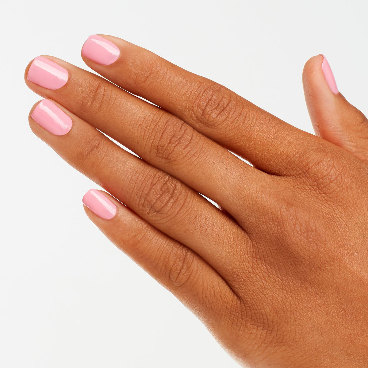A manicure painted in OPI Pink-ing of You