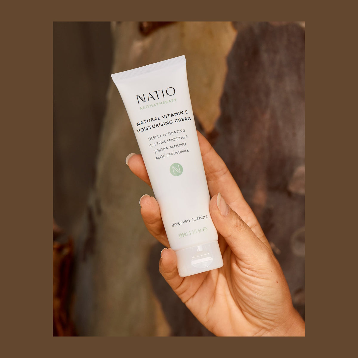 Natio Natural Vitamin E Moisturising Cream 100ml shown in use