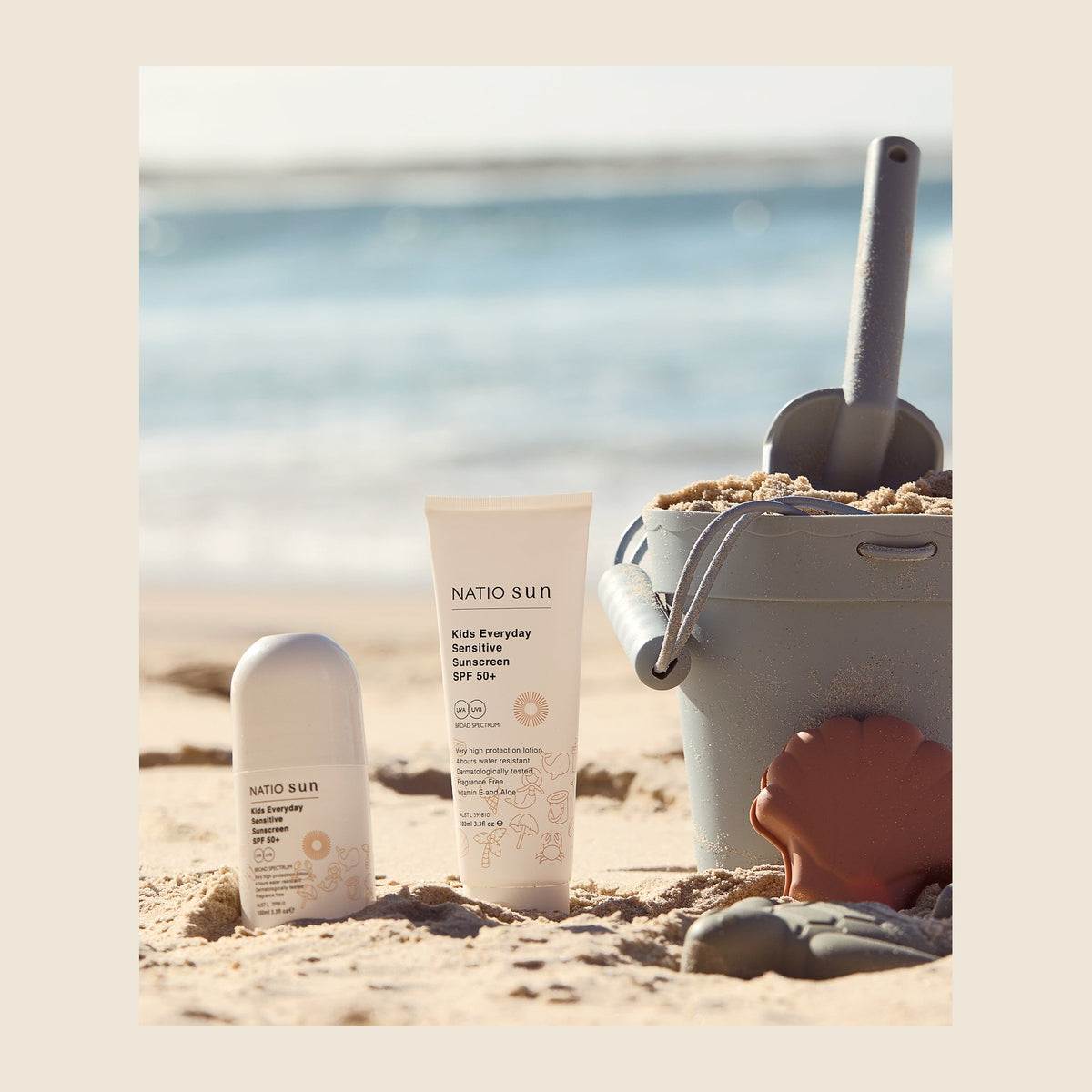 Natio Kids Everyday Sensitive Sunscreen SPF50+ 100ml Tube styled in a set photograph