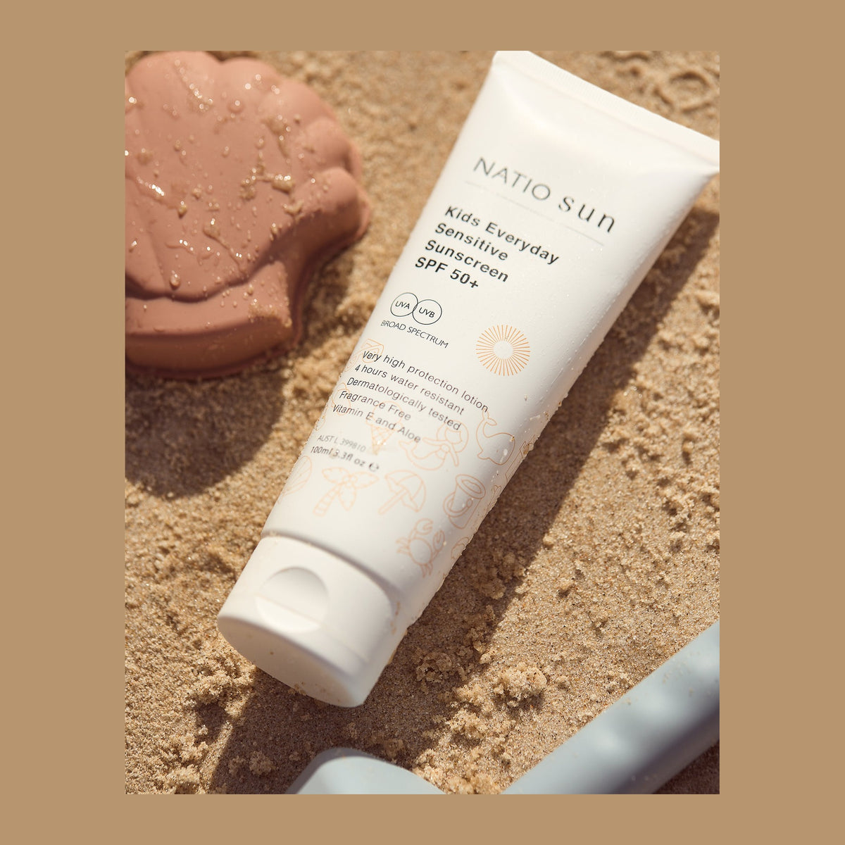 Natio Kids Everyday Sensitive Sunscreen SPF50+ 100ml Tube styled in a set photograph
