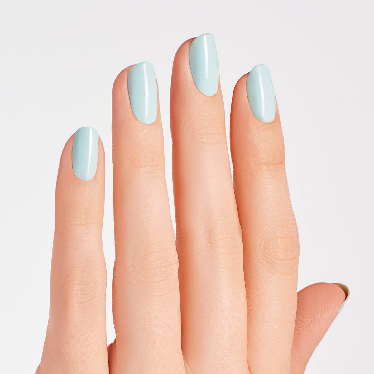 A manicure painted in OPI Mexico City Move-mint