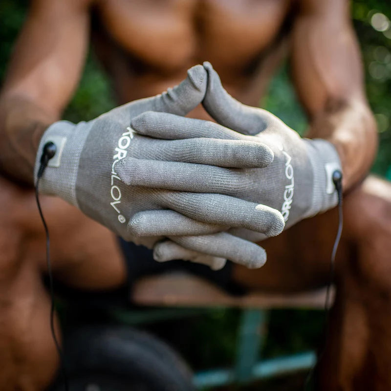 Image of NuroKor KorGlov Treatment Gloves being used