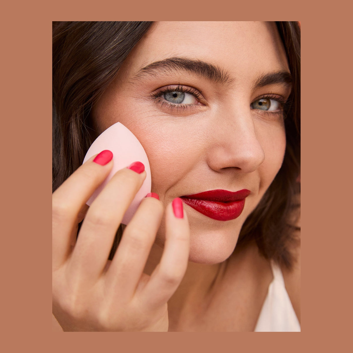 Natio Angled Teardrop Blending Sponge shown in use