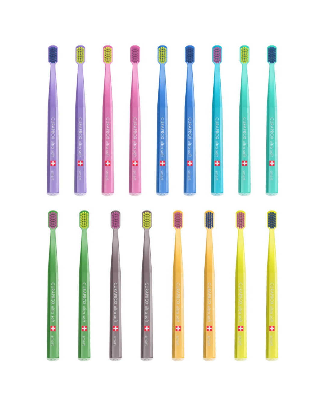 Curaprox CS smart toothbrushes laid out in the assorted colour range