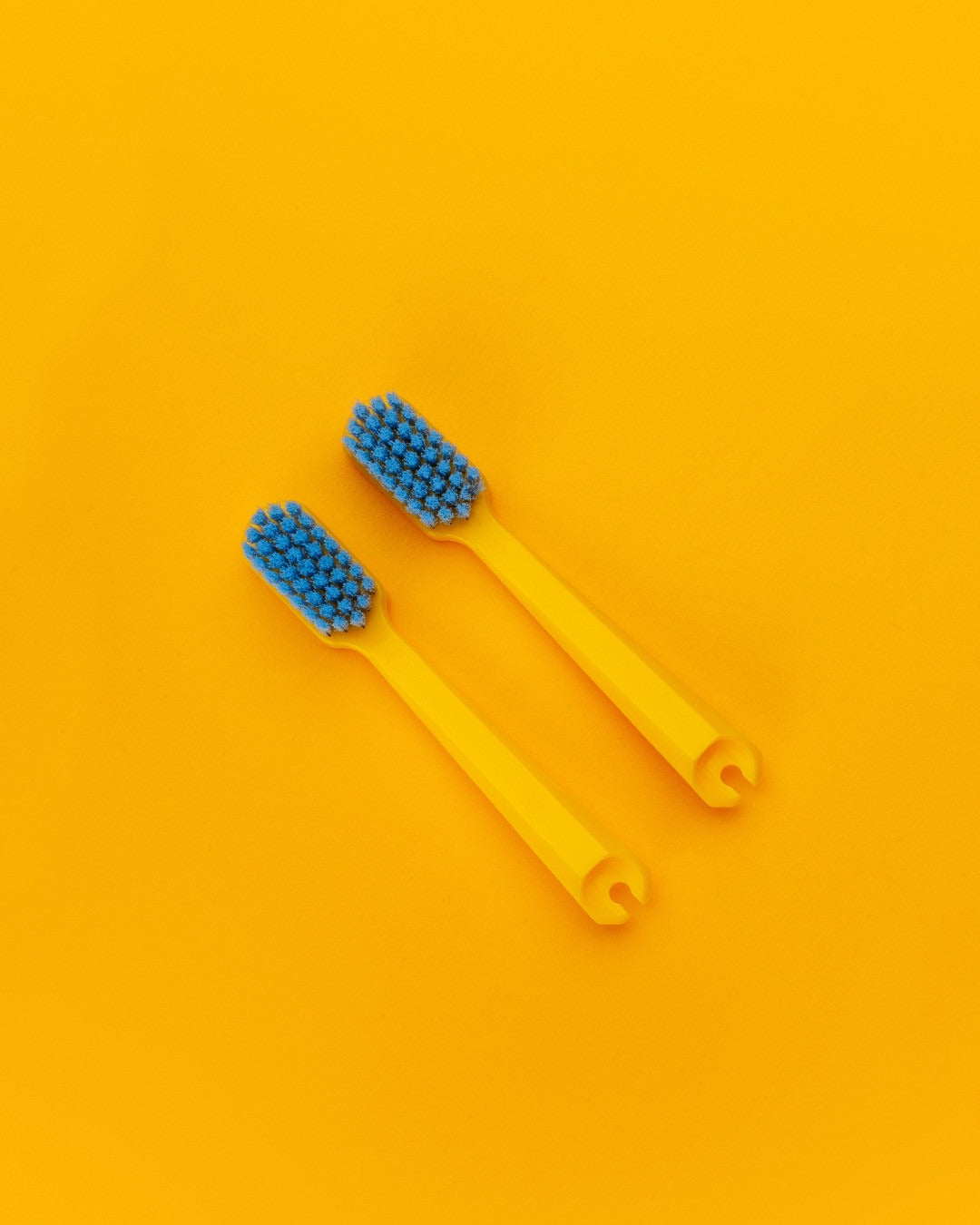 Two Curaprox travel set replacement brush heads