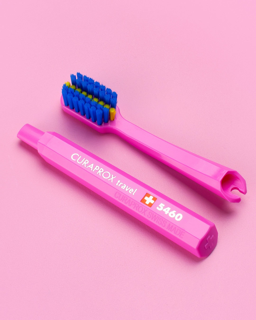 Two pink Curaprox ortho travel replacement brush heads