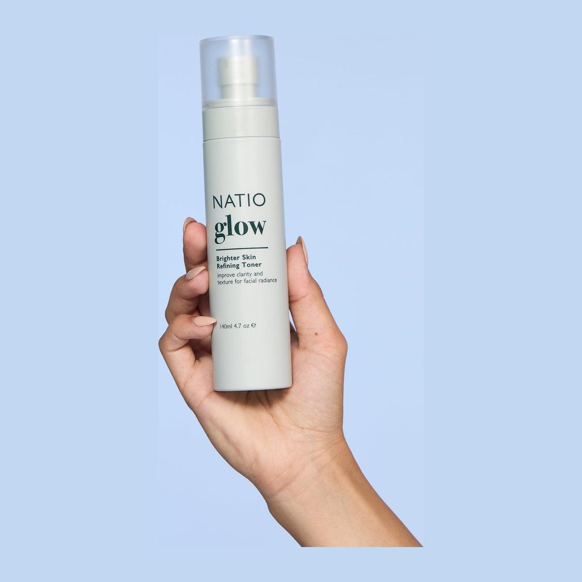 Natio Glow Brighter Skin Refining Toner shown in use