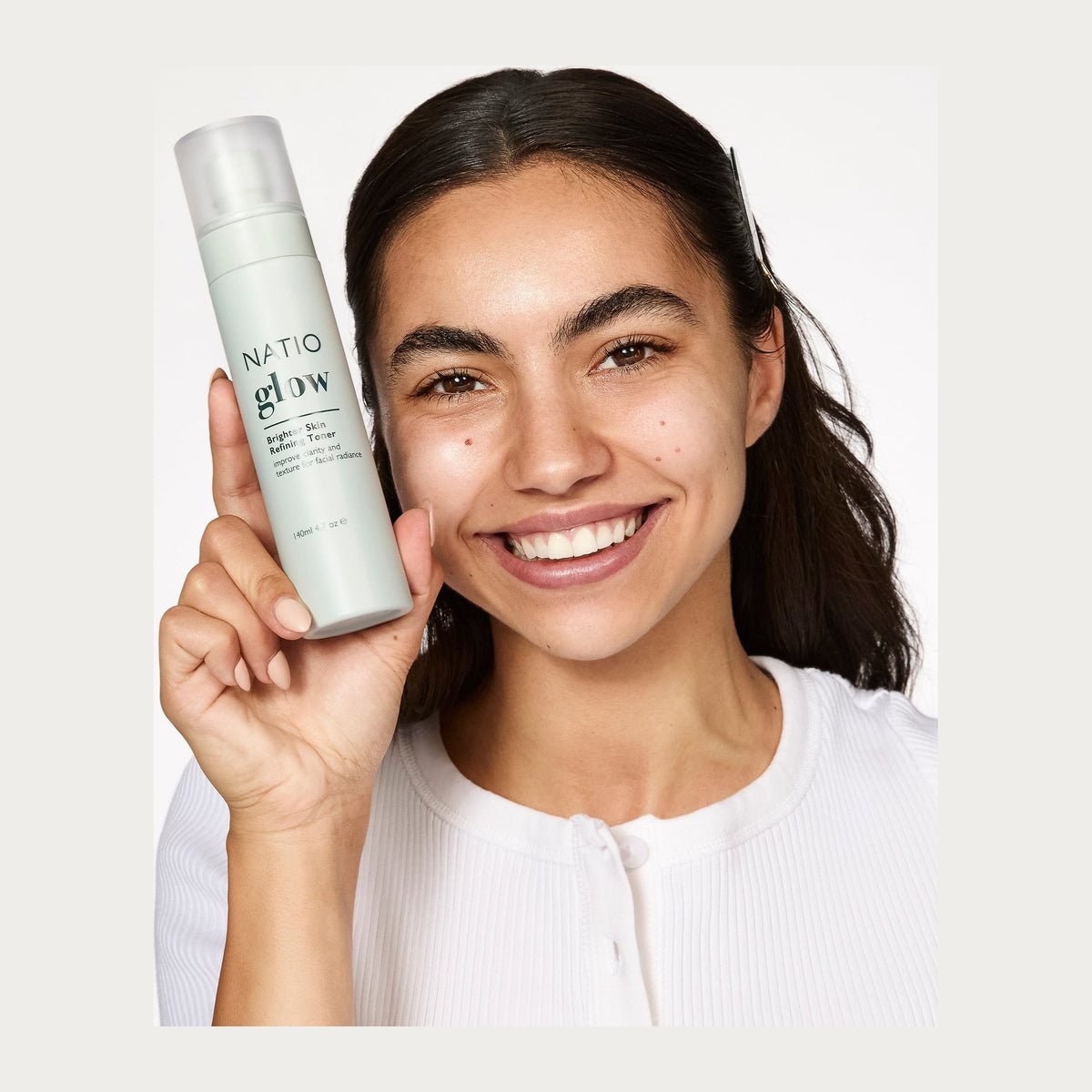 Natio Glow Brighter Skin Refining Toner shown in use