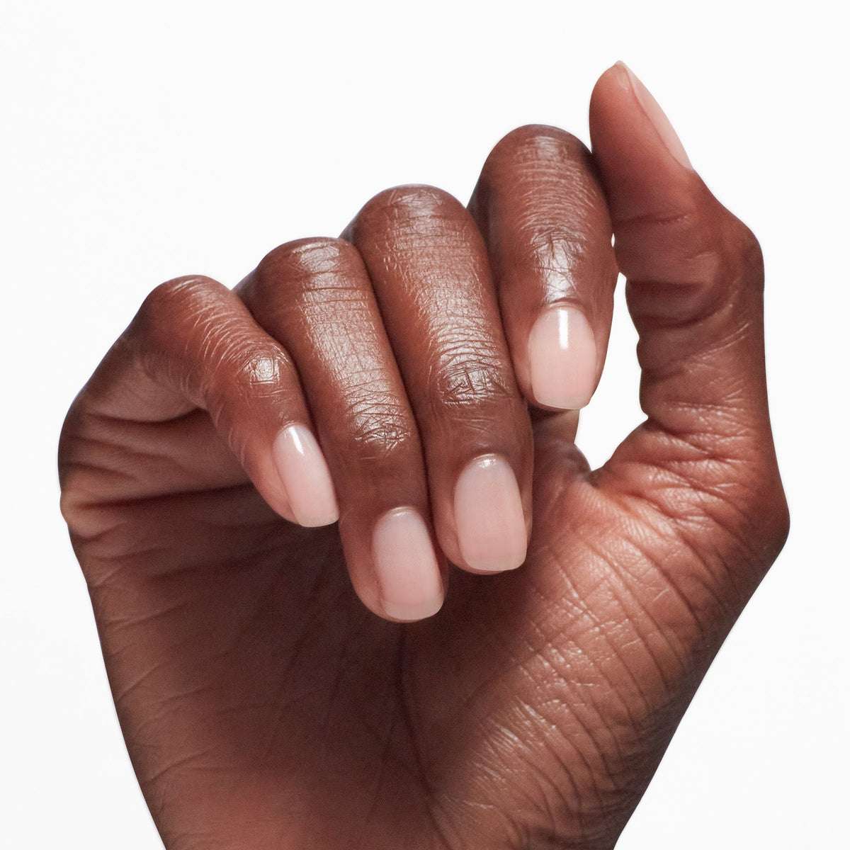 A manicure painted in OPI Natural