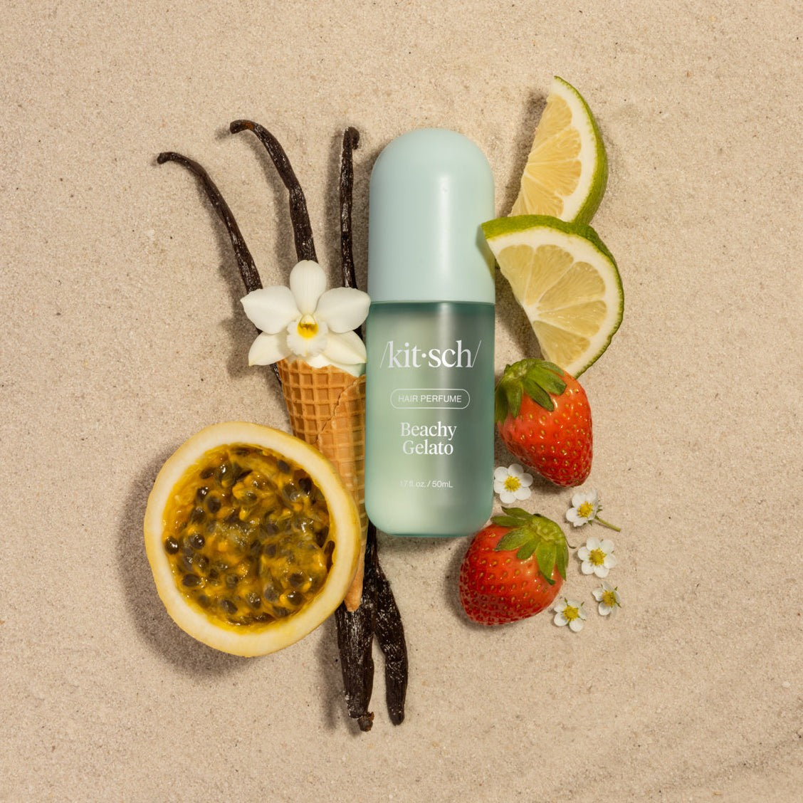 Beachy Gelato scent ingredients laid out: lime, passion fruit, strawberry and vanilla
