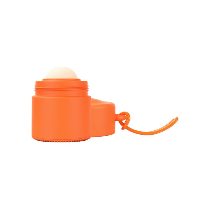 Solmates Desert Orange, open, showing the roll-on ball and lid