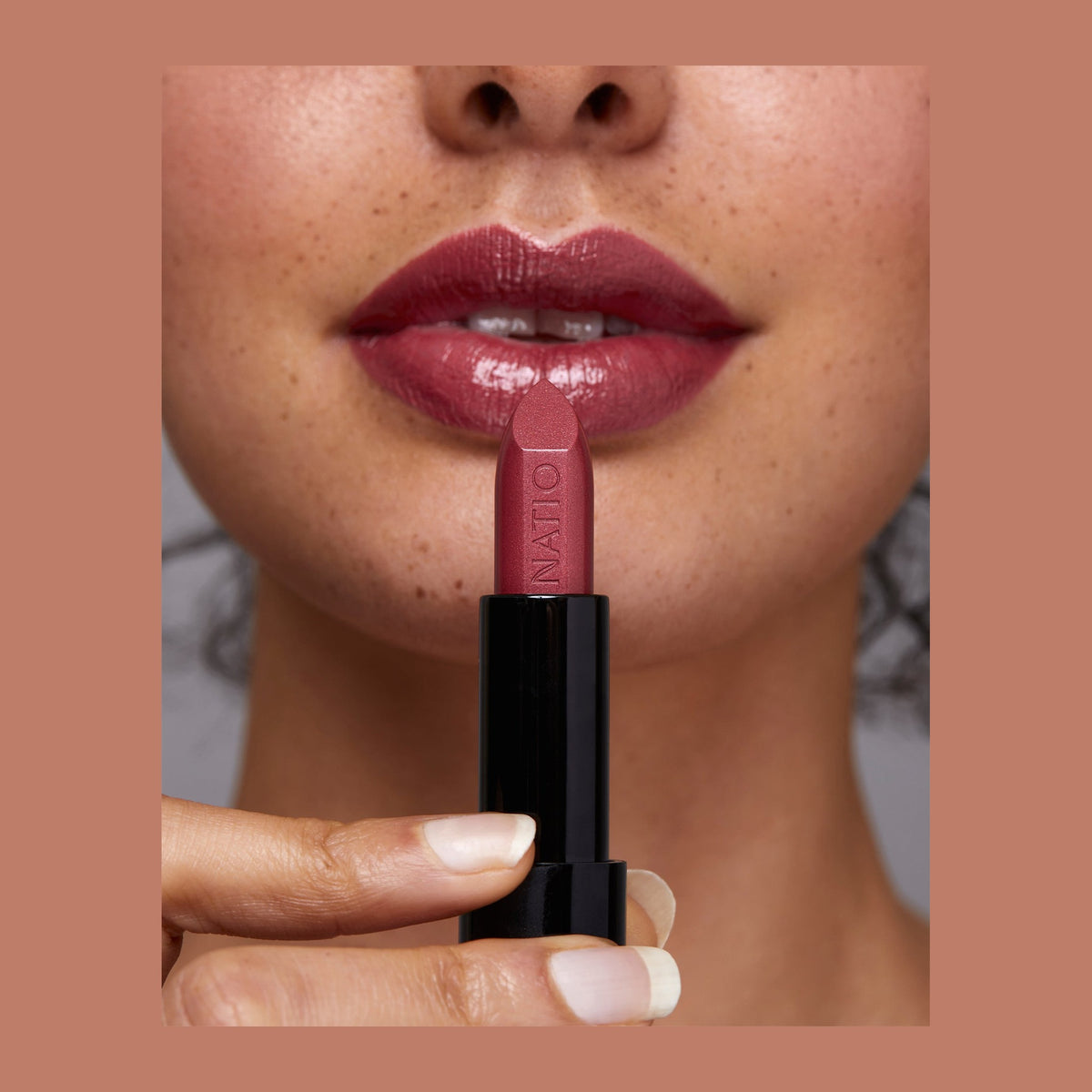 Natio Lip Colour Spring shown in use