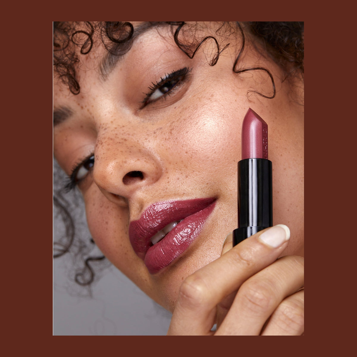 Natio Lip Colour Spring shown in use