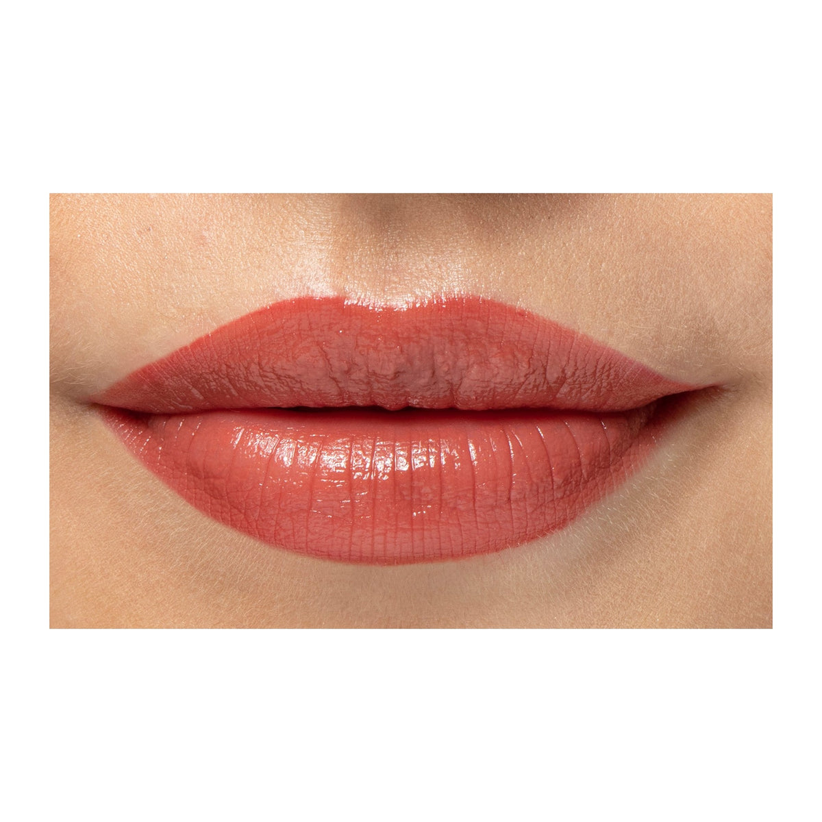 Natio Lip Colour Sunset shown in use