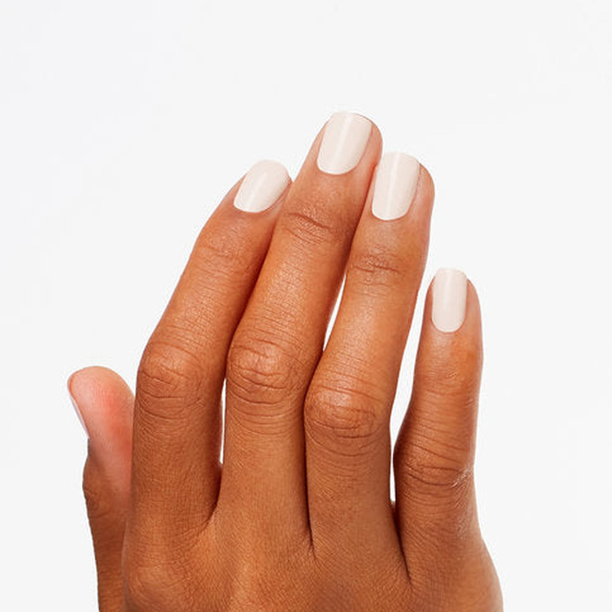 A manicure painted in OPI Coastal Sand-Tuary