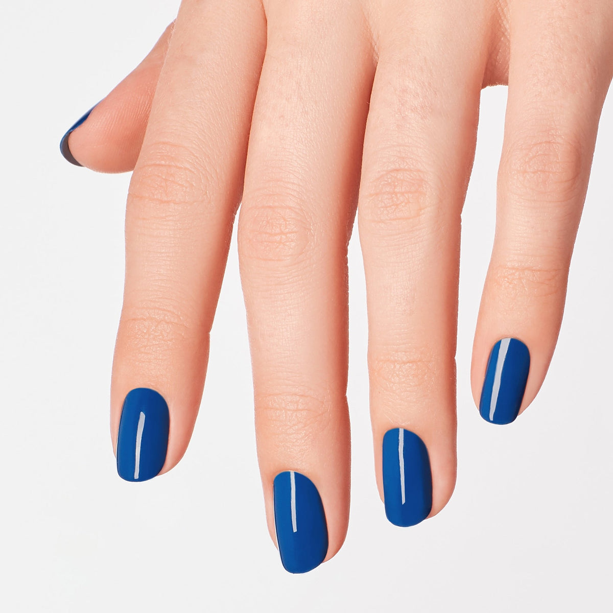 A manicure painted in OPI Mi Casa Es Blue Casa