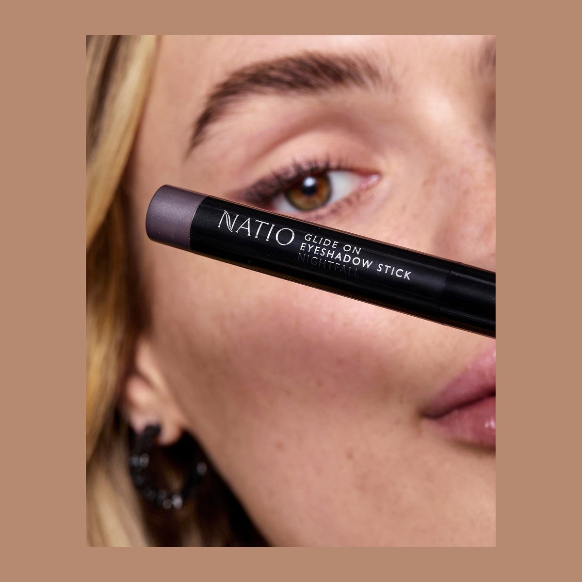 Natio Glide On Eye Shadow Stick Nightfall shown in use