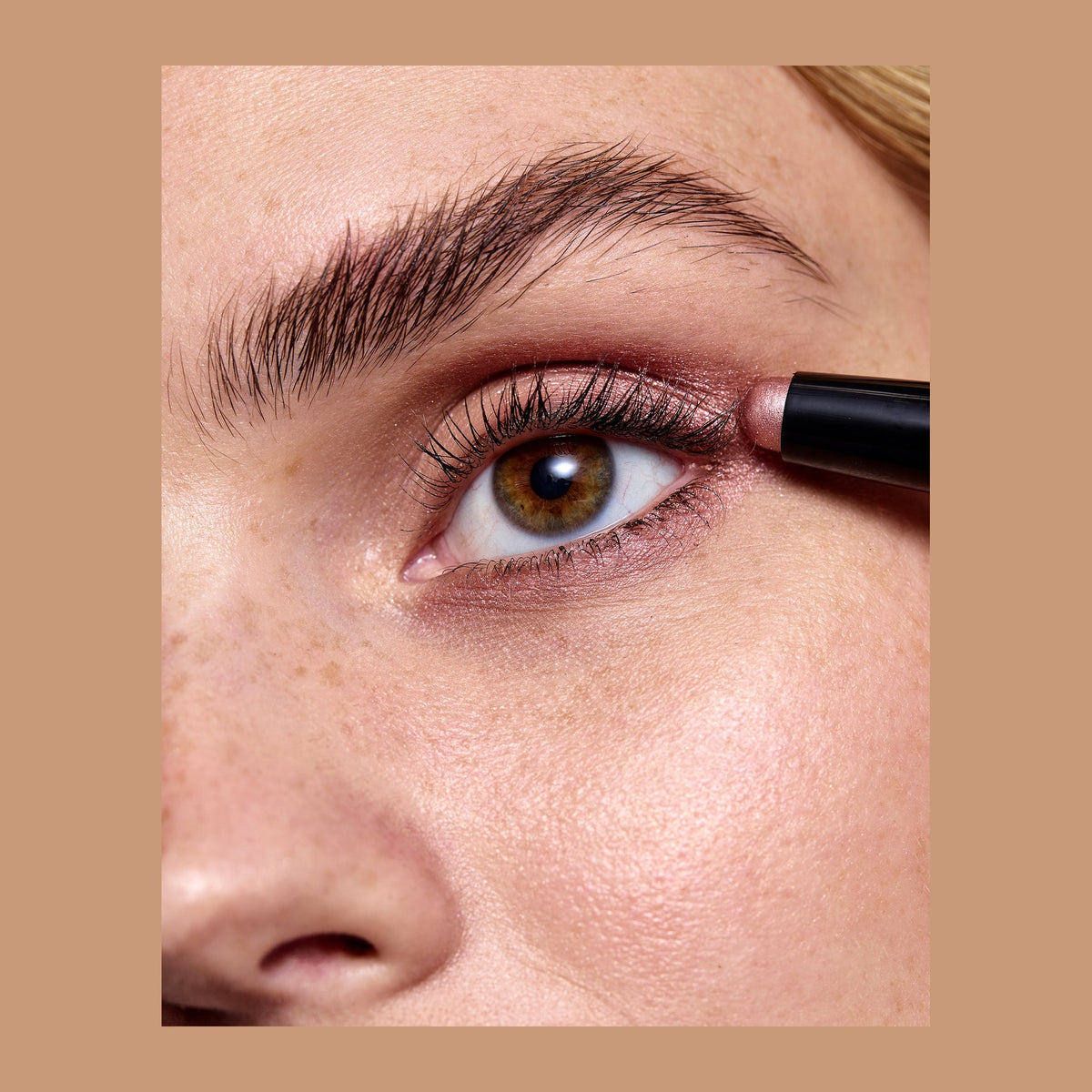 Natio Glide On Eye Shadow Stick Afterglow shown in use